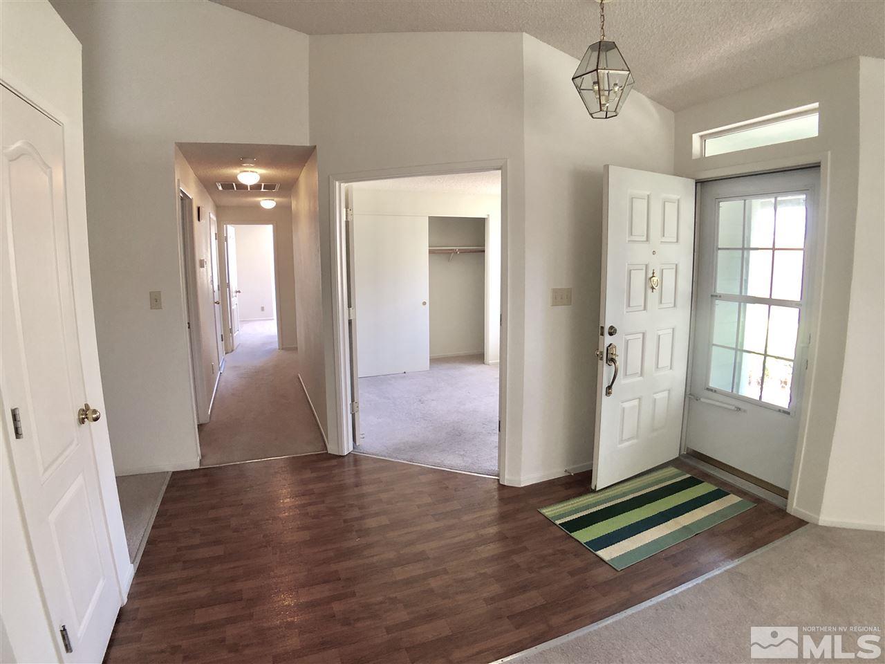 6364 Chesterfield Lane Reno, NV 89523 - Photo 16 of 29 wooden floor in an empty room with a window