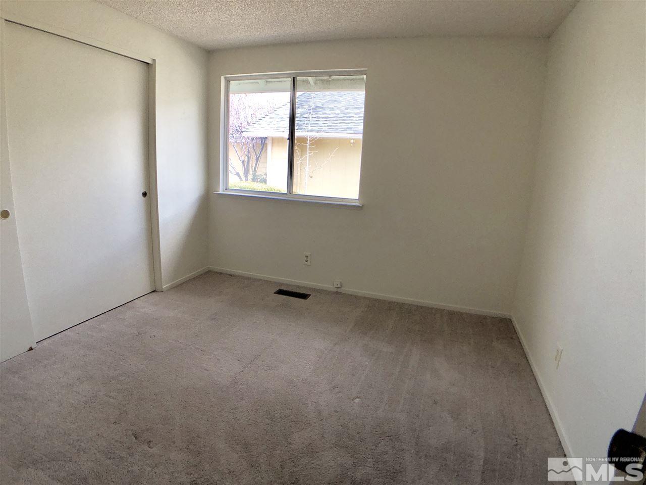 6364 Chesterfield Lane Reno, NV 89523 - Photo 18 of 29 an empty room with a window