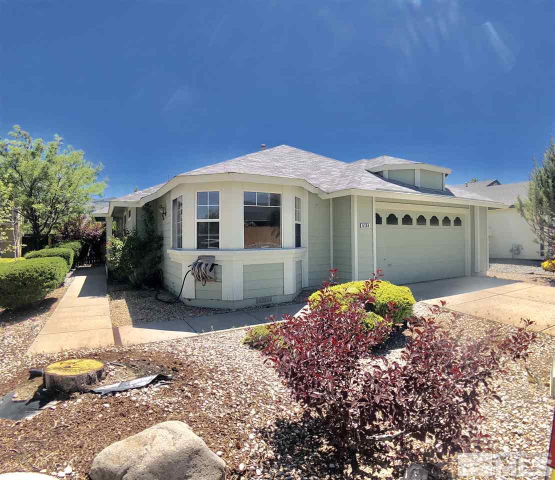 6364 Chesterfield Lane Reno, NV 89523 - Photo 3 of 29 a front view of a house with a yard