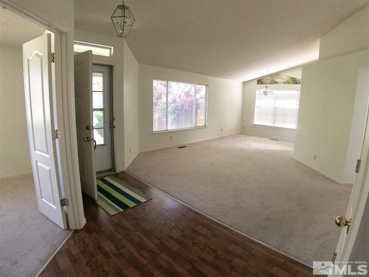 6364 Chesterfield Lane Reno, NV 89523 - Photo 5 of 29 an empty room with windows