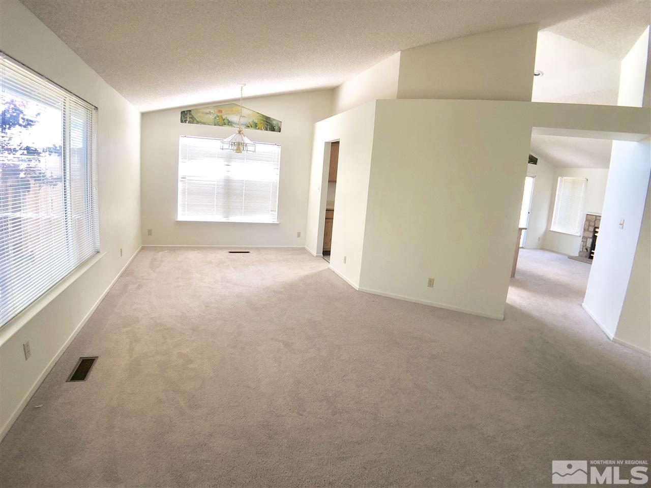6364 Chesterfield Lane Reno, NV 89523 - Photo 8 of 29 a view of an empty room with a window