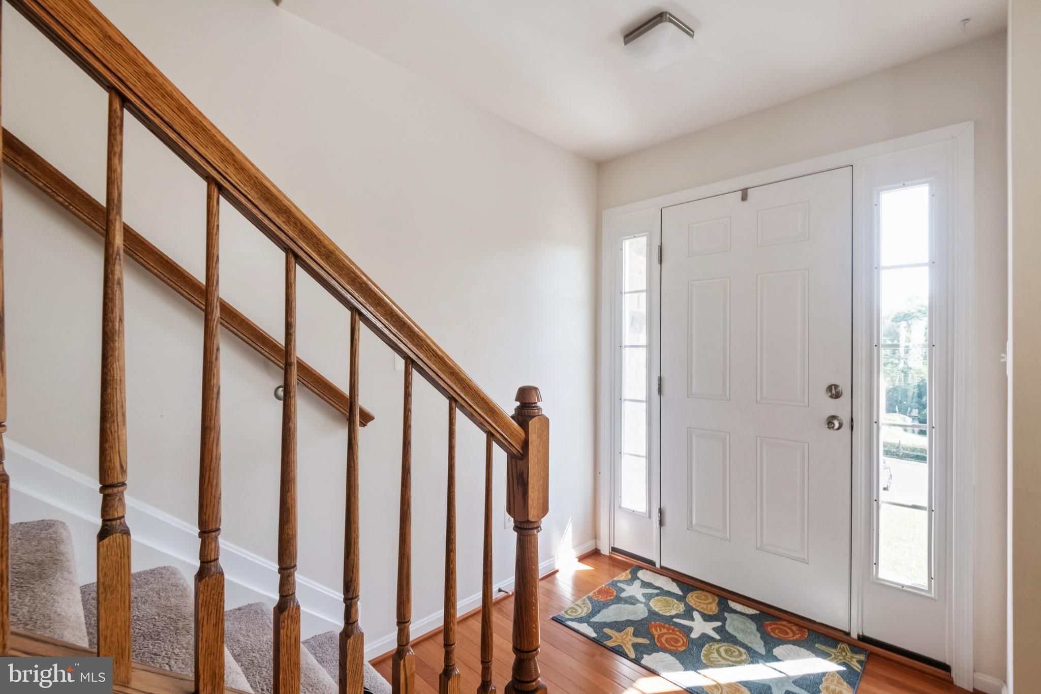 6016 Hanover Road Elkridge, MD 21075 - Photo 3 of 45 Entryway w/Gleaming Wood Floors Flowing Throughout