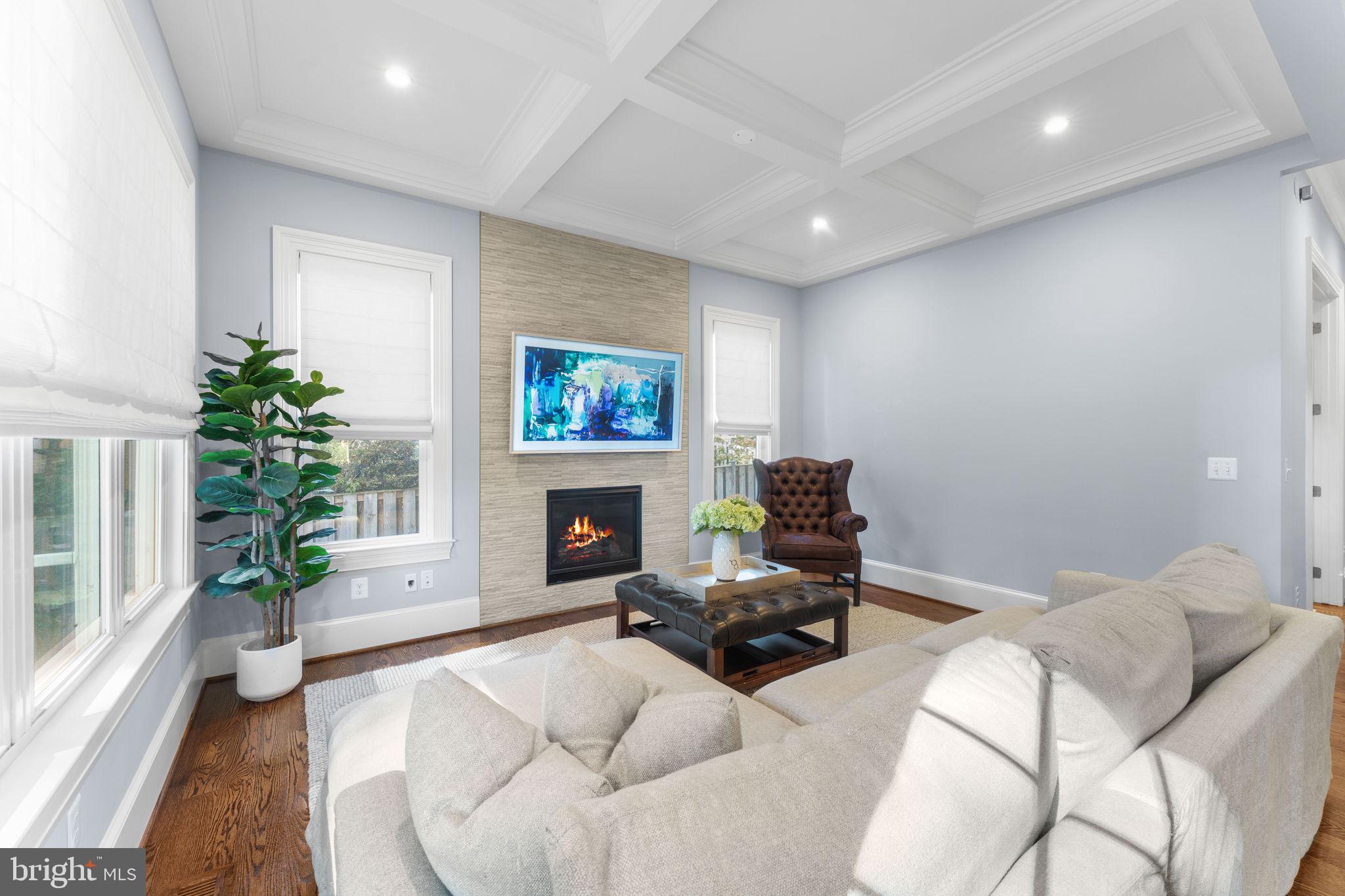 106 Tapawingo Road Southwest Vienna, VA 22180 - Photo 21 of 91 a living room with furniture and a fireplace