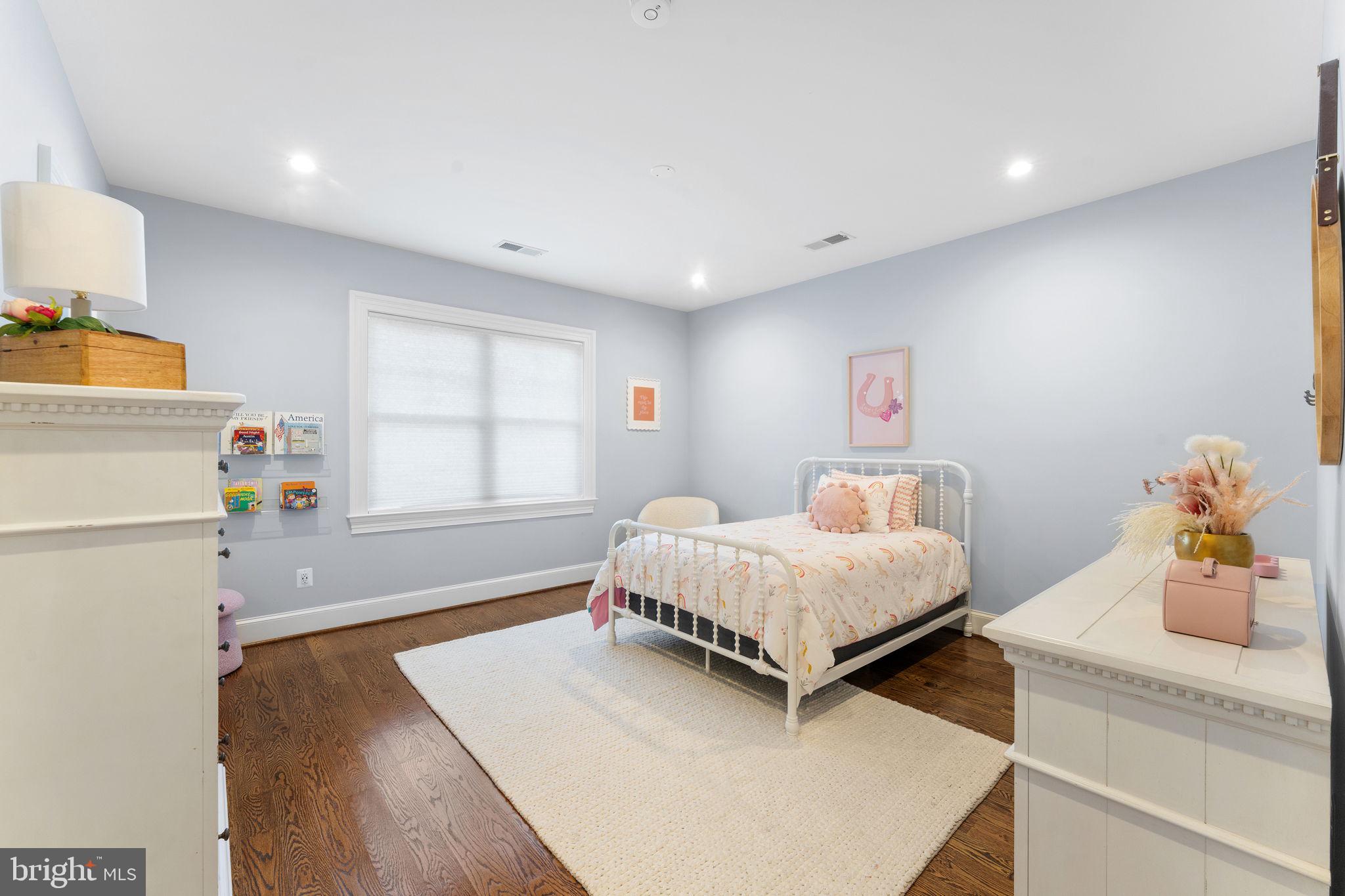 106 Tapawingo Road Southwest Vienna, VA 22180 - Photo 38 of 91 a bedroom with a bed and a window
