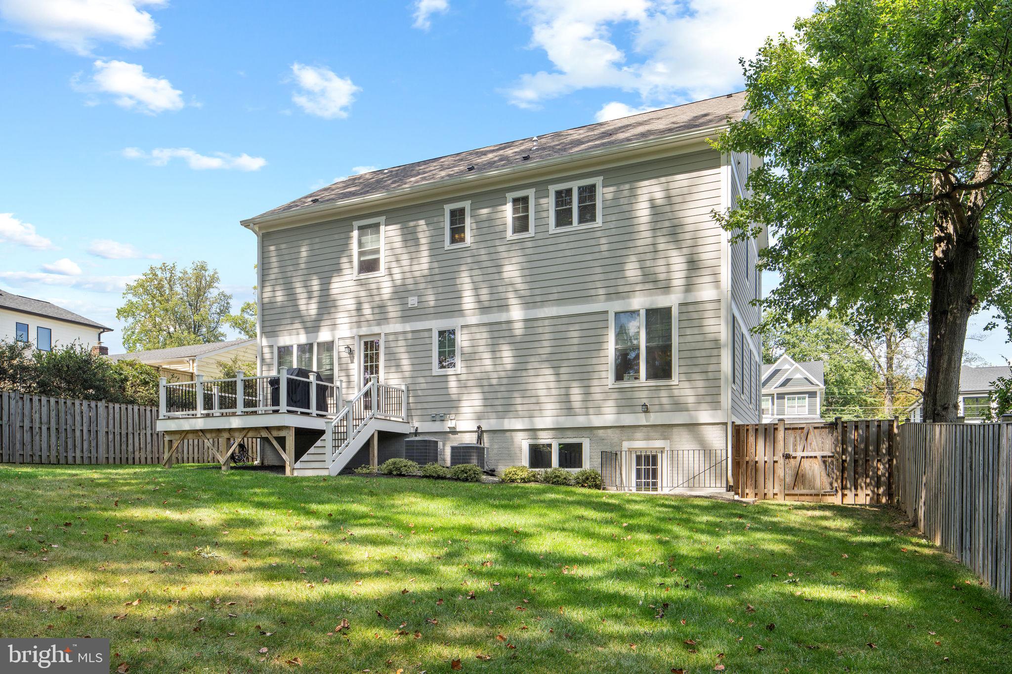 106 Tapawingo Road Southwest Vienna, VA 22180 - Photo 71 of 91 a front view of a house with a yard table and chairs