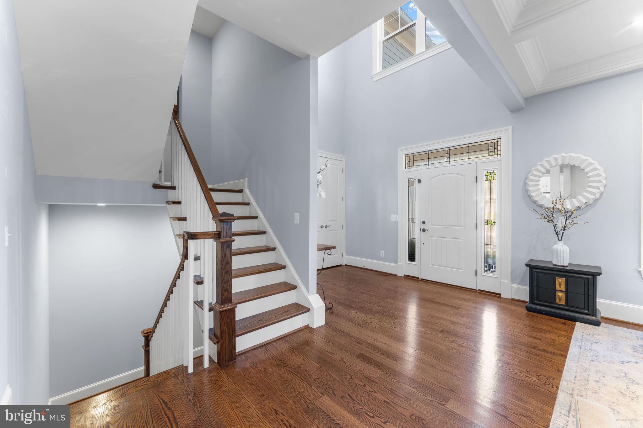 106 Tapawingo Road Southwest Vienna, VA 22180 - Photo 8 of 91 a view of a hallway with wooden floor and staircase