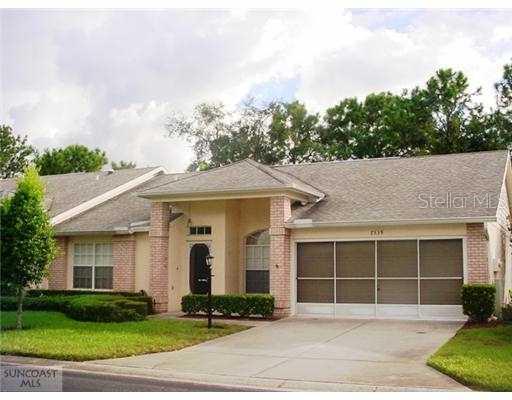 7338 Woodhollow Road Spring Hill, FL 34606 - Photo 1 of 1 Exterior Front - Lake of the Pines offers maintenance free living & is a pet friendly Village