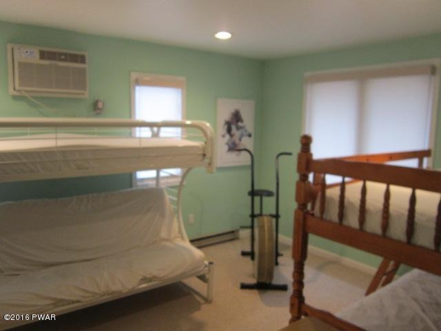 203 Westcolang Road Lackawaxen, PA 18435 - Photo 12 of 15 a bedroom with window