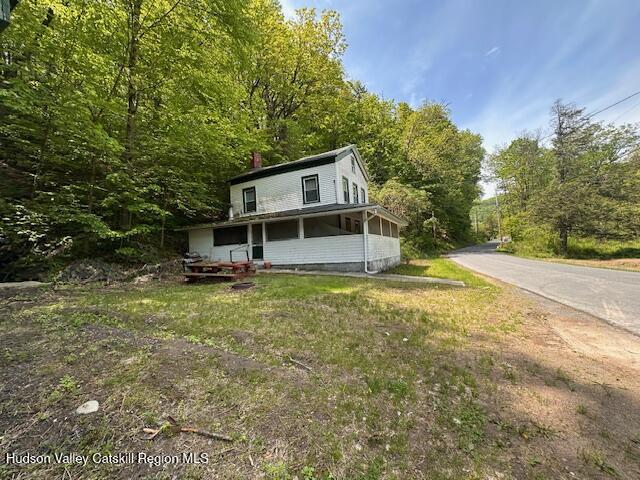 818 Cauterskill Road Catskill, NY 12414 - Photo 2 of 17 a view of a house with a backyard