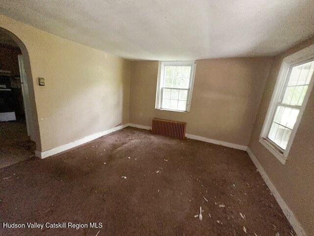 818 Cauterskill Road Catskill, NY 12414 - Photo 5 of 17 a view of an empty room with a window