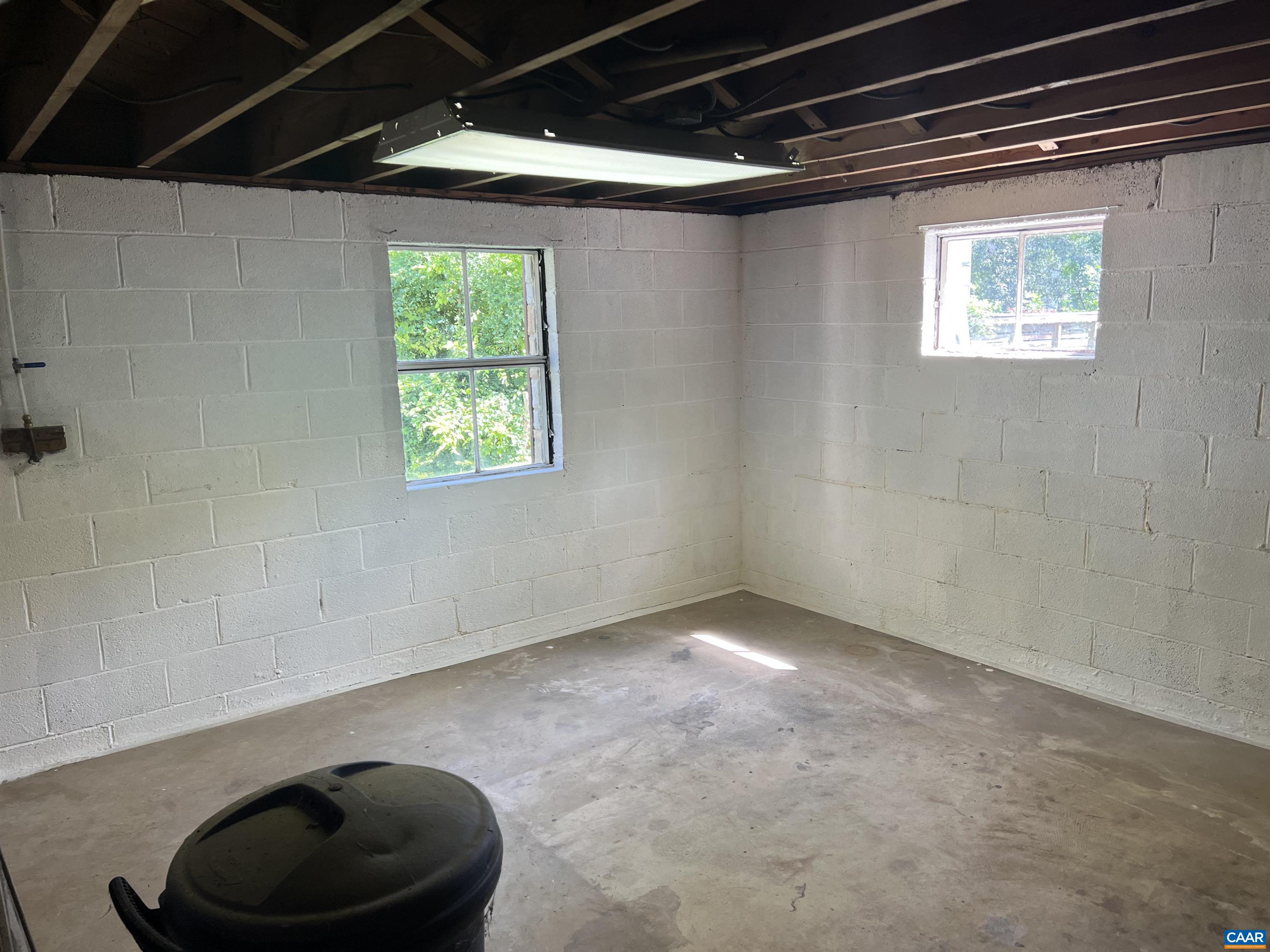 1320 Avon Street Charlottesville, VA 22902 - Photo 23 of 40 a view of an empty room with a window