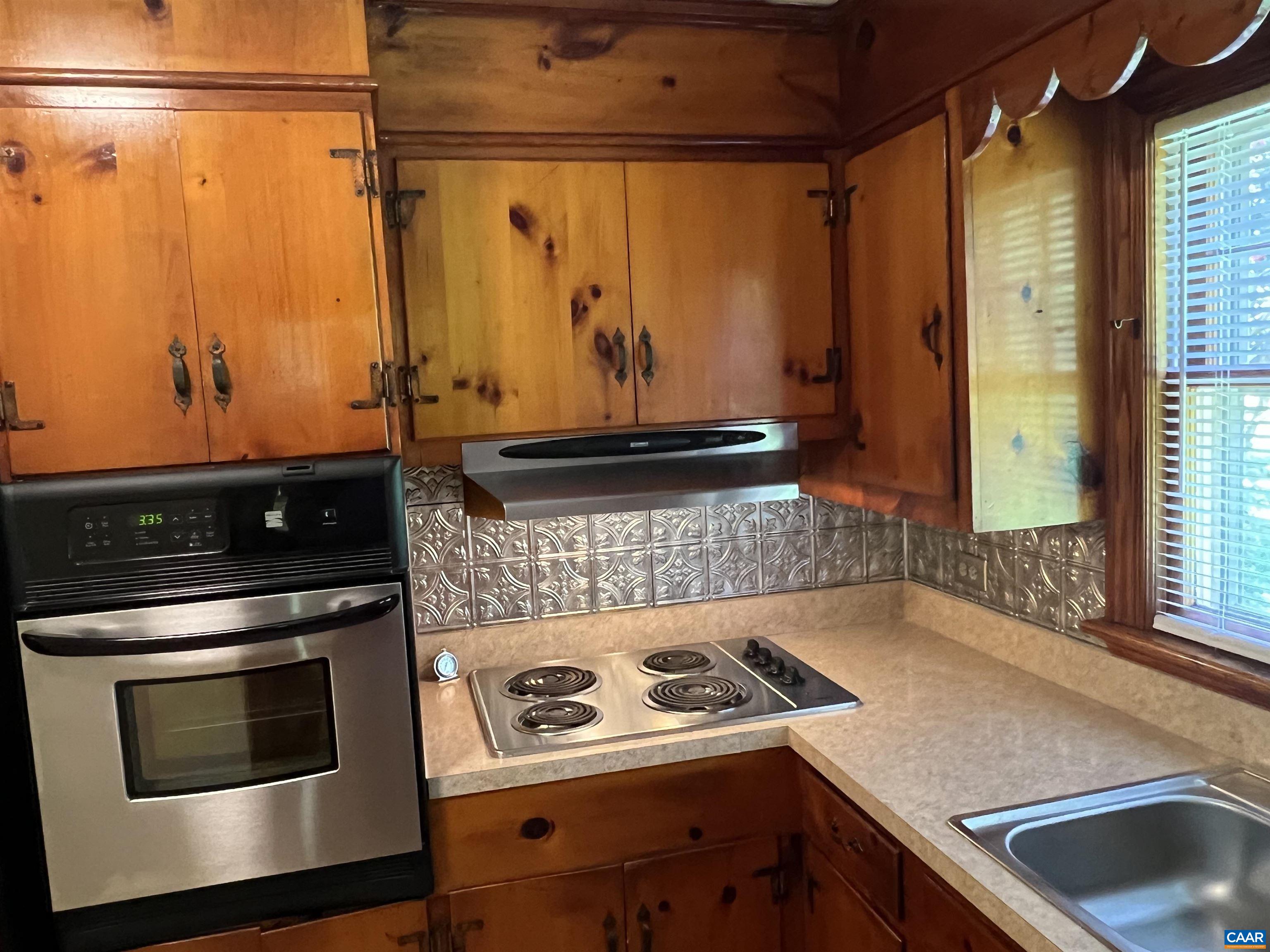 1320 Avon Street Charlottesville, VA 22902 - Photo 8 of 40 a kitchen with a stove and a sink