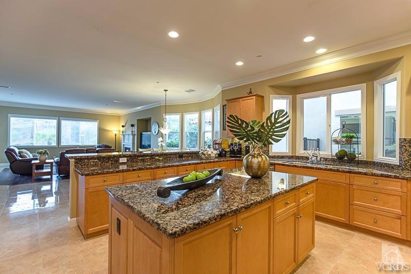 12366 Nelson Road Moorpark, CA 93021 - Photo 23 of 67 a kitchen with lots of counter top space and living room