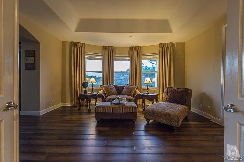 12366 Nelson Road Moorpark, CA 93021 - Photo 33 of 67 a living room with furniture window and a wooden floor