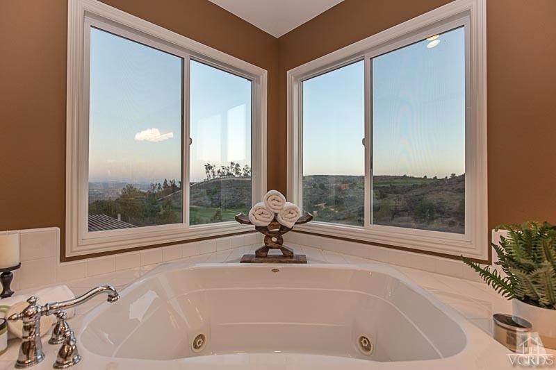 12366 Nelson Road Moorpark, CA 93021 - Photo 38 of 67 a bathroom with a bathtub and a shower