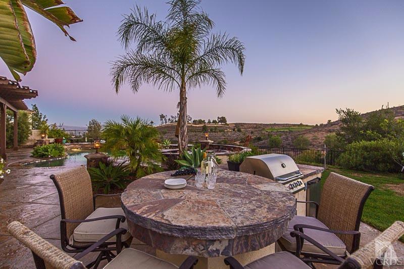 12366 Nelson Road Moorpark, CA 93021 - Photo 52 of 67 a view of a chairs and table in patio