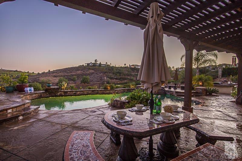 12366 Nelson Road Moorpark, CA 93021 - Photo 55 of 67 a view of a table and chairs in the patio