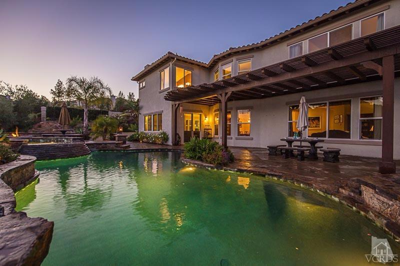 12366 Nelson Road Moorpark, CA 93021 - Photo 56 of 67 a view of a house with swimming pool and a yard