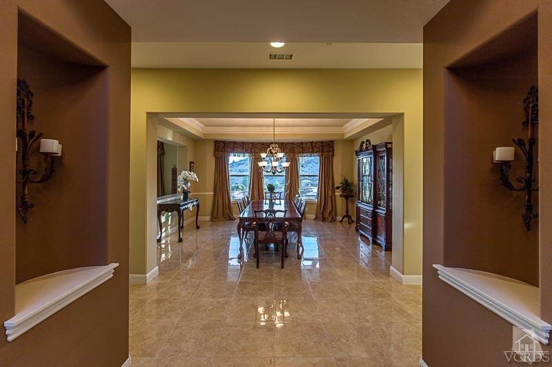 12366 Nelson Road Moorpark, CA 93021 - Photo 8 of 67 a dining room with furniture and a potted plant