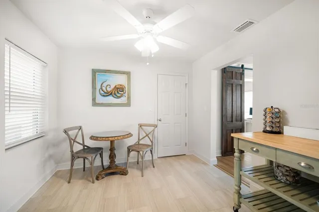 a workspace with furniture and window