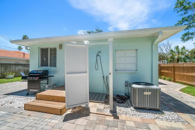 a backyard of a house with seating space