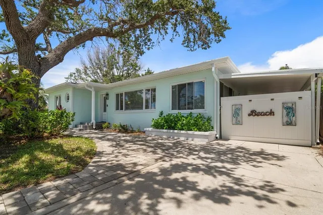 a view of front door and potted plant