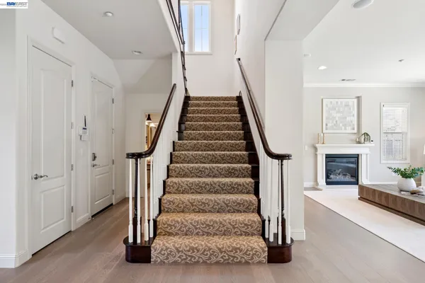 a bed room with furniture and a window