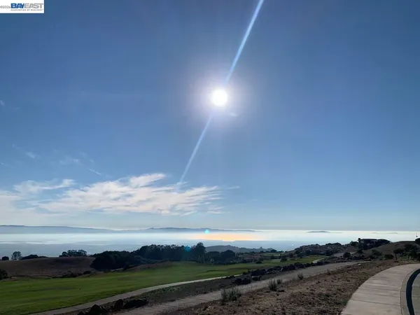 a aerial view of a house with a patio