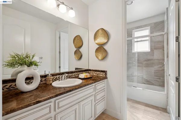 a bathroom with a shower and a bathtub