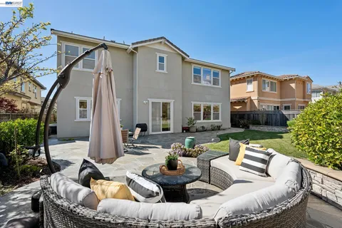 a view of a house with swimming pool