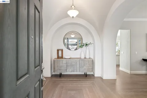 a view of a hallway with staircase