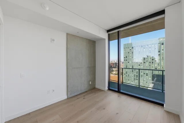 a view of a room with large window