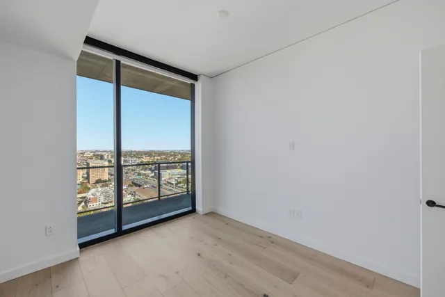 an empty room with windows