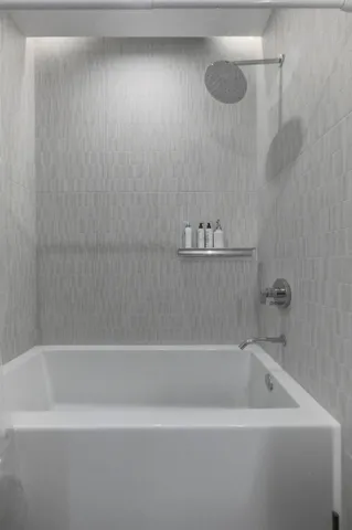 a bathroom with a bathtub