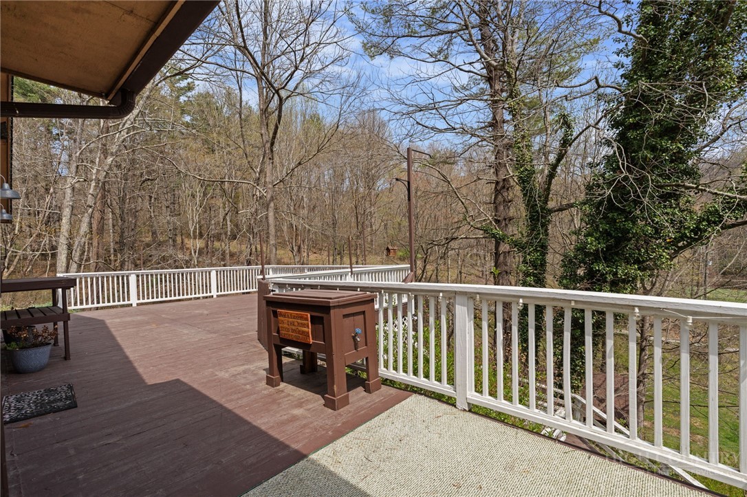 2345 Watauga River Road Sugar Grove, NC 28679 - Photo 40 of 50 a view of a two chairs and table in the balcony