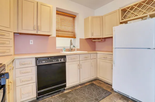 a kitchen with a stove microwave and refrigerator