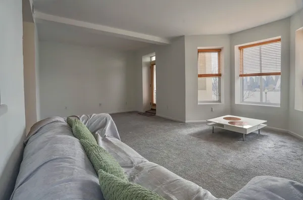 a living room with furniture and window