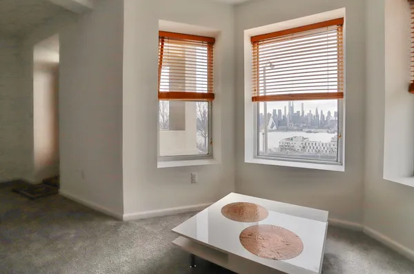 a room with furniture and a window