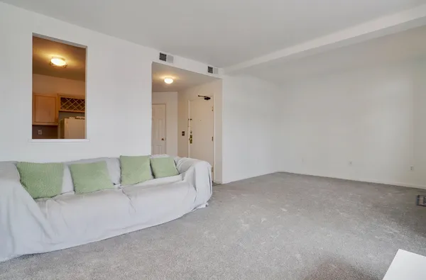 a kitchen with a refrigerator stove and microwave