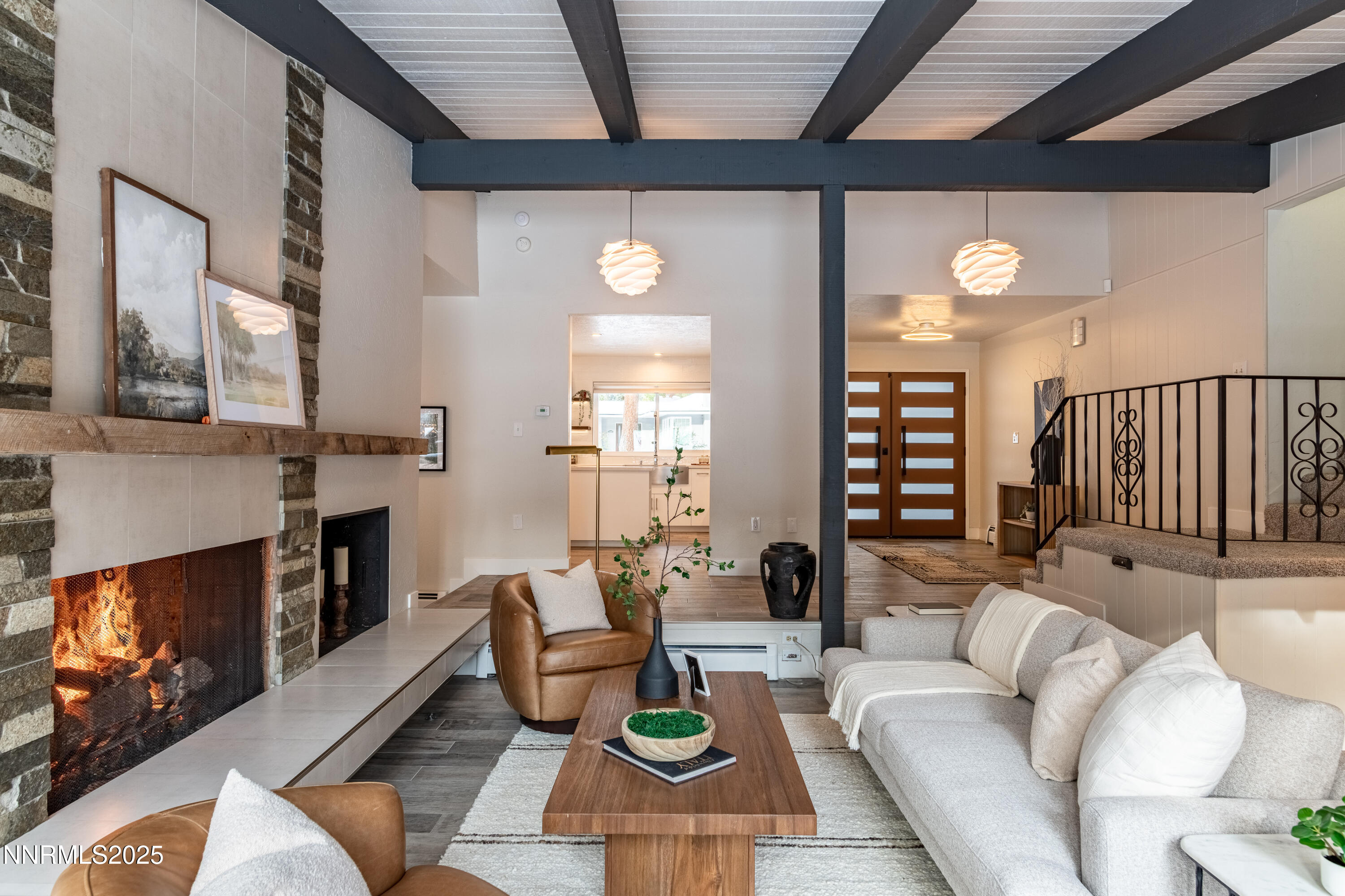 189 Ray Way Zephyr Cove, NV 89448 - Photo 13 of 36 a living room with furniture and a fireplace