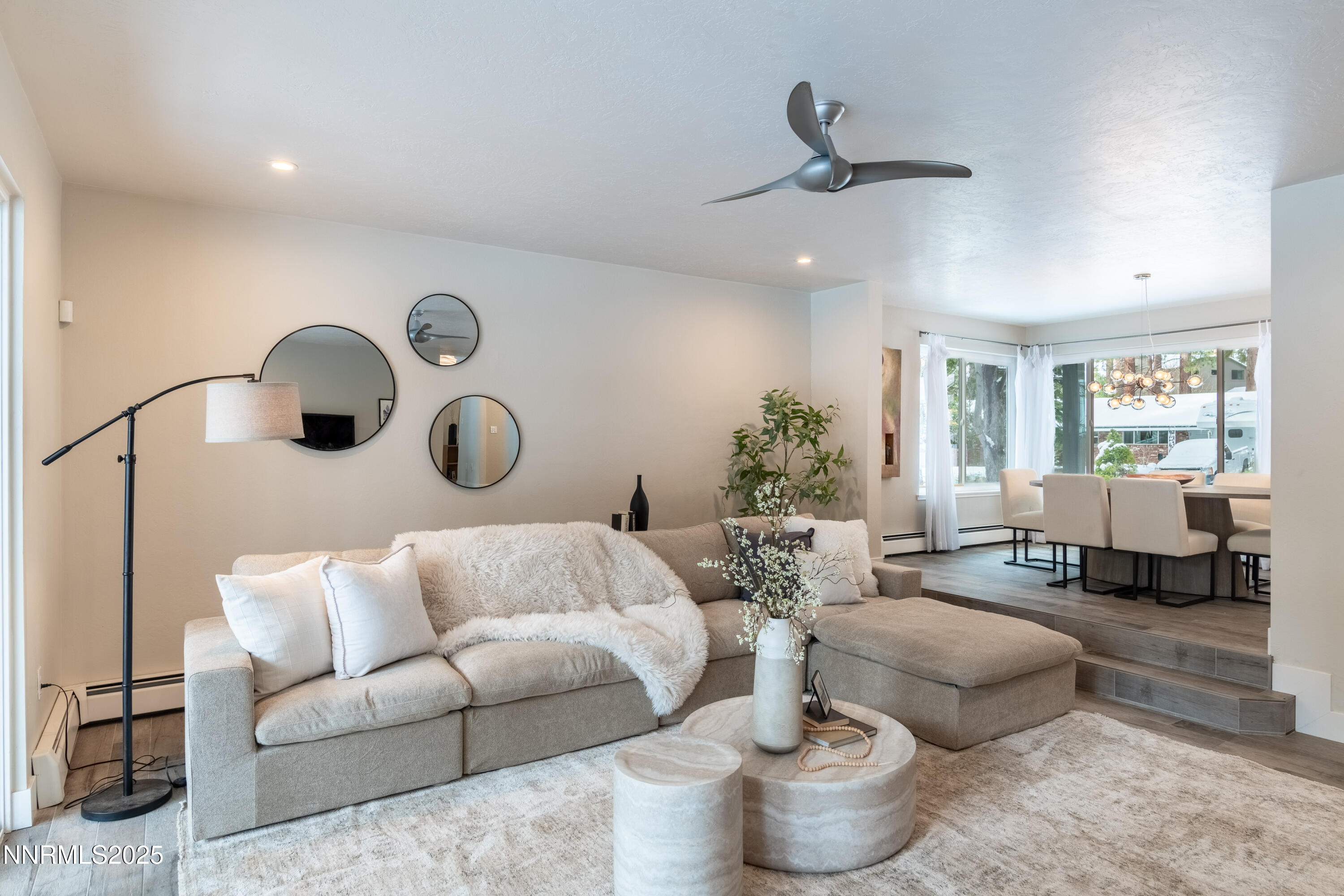 189 Ray Way Zephyr Cove, NV 89448 - Photo 14 of 36 a living room with furniture and a large window