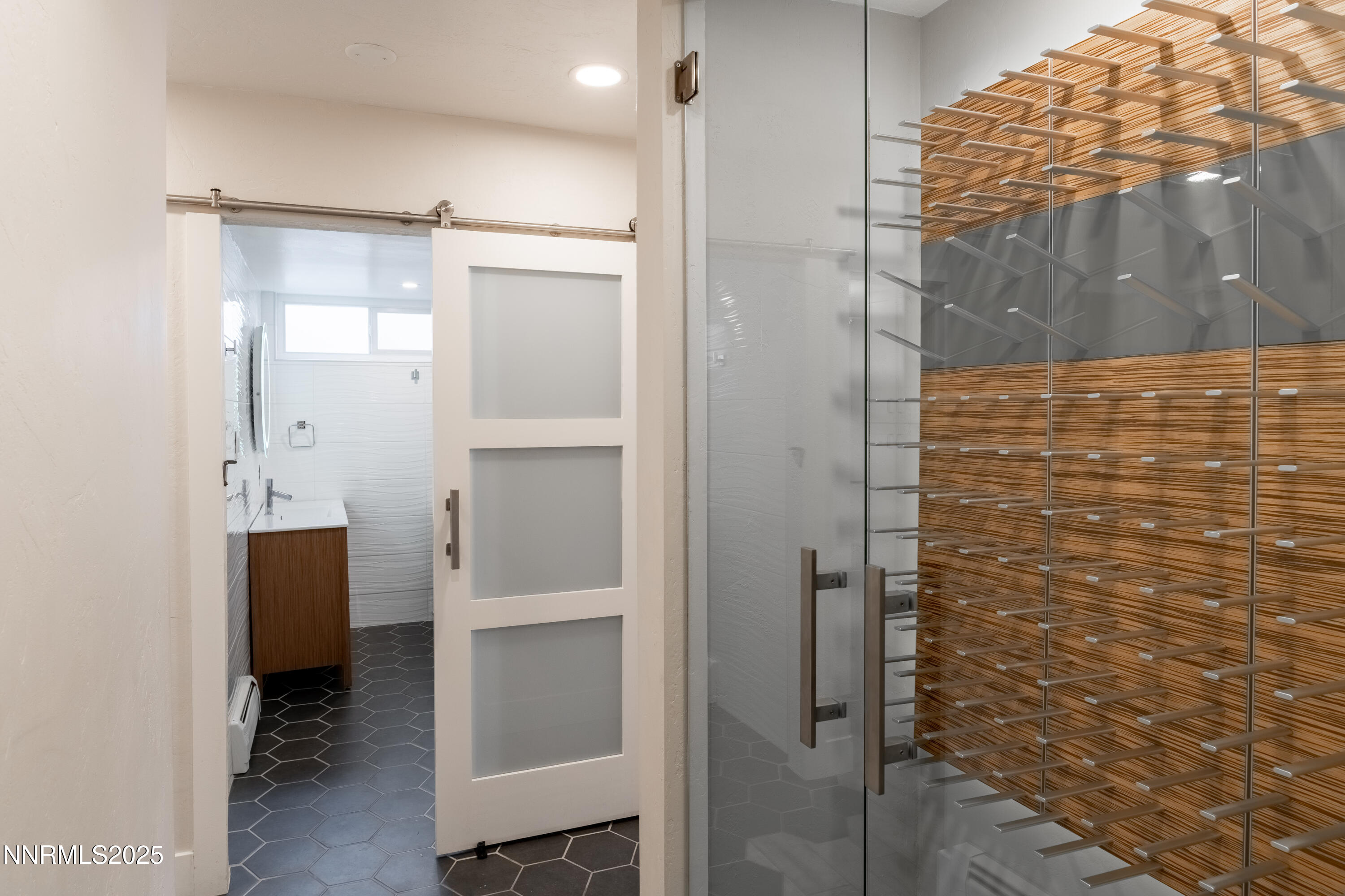 189 Ray Way Zephyr Cove, NV 89448 - Photo 34 of 36 a bathroom with a shower and a sink