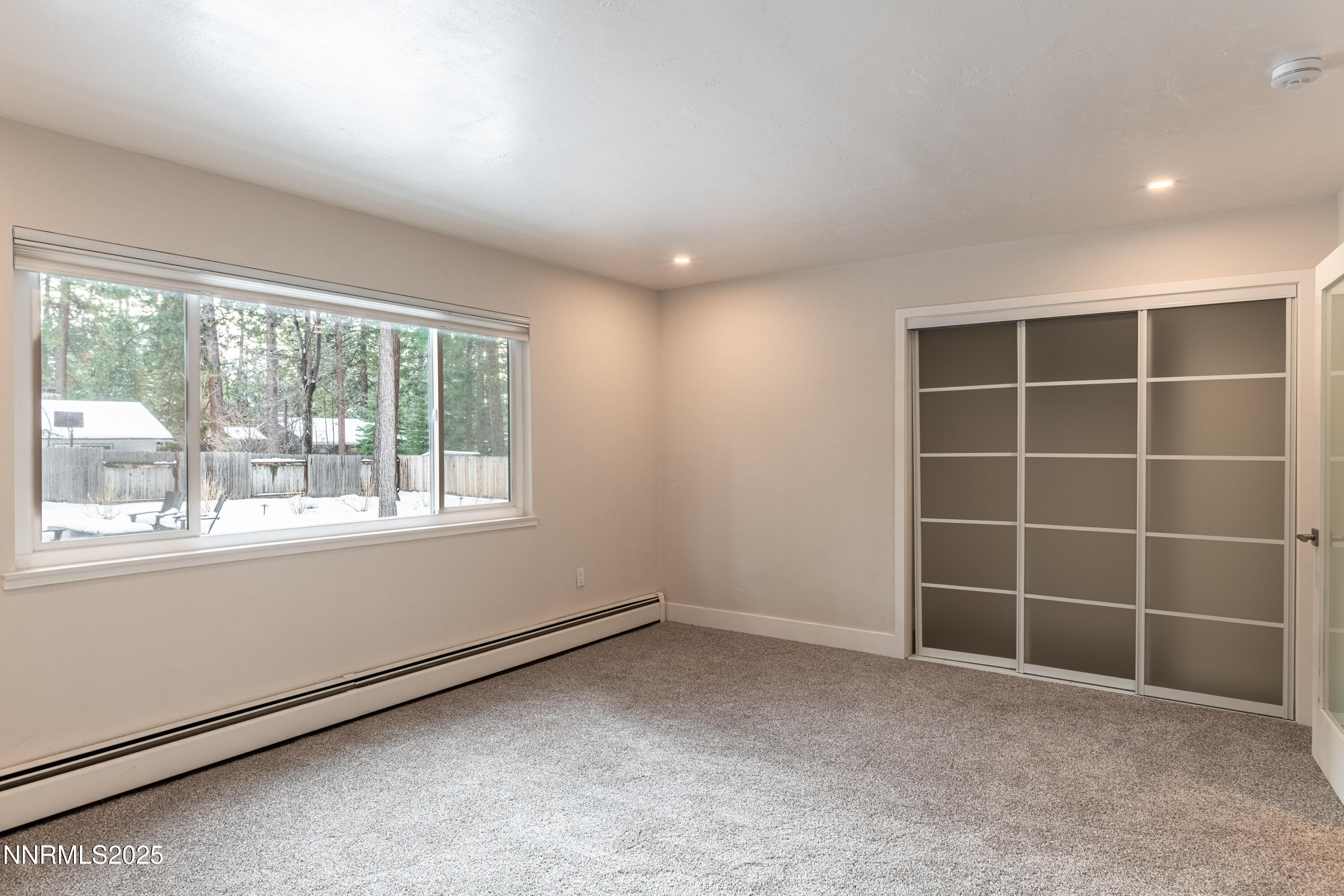 189 Ray Way Zephyr Cove, NV 89448 - Photo 36 of 36 an empty room with a windows and closet