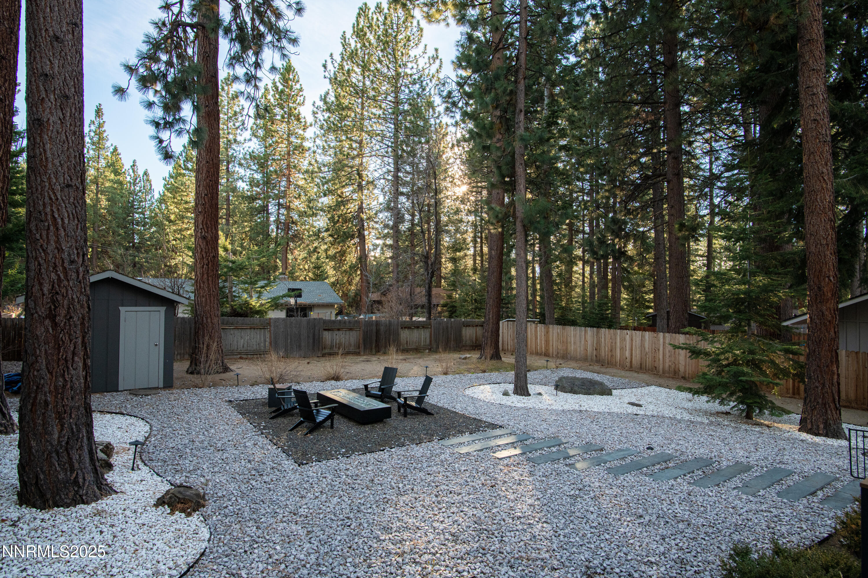 189 Ray Way Zephyr Cove, NV 89448 - Photo 6 of 36 a view of a backyard with sitting area