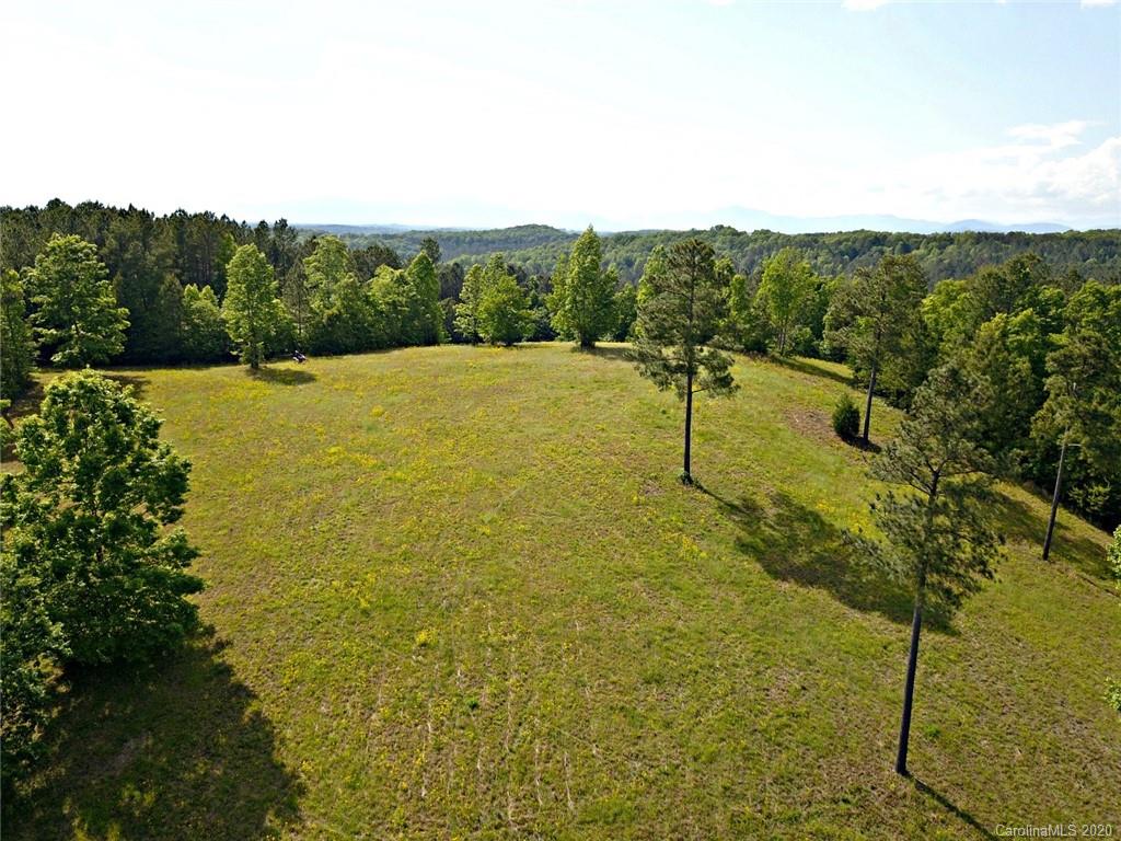 # Northeast Polk County Line Road East, Unit 5 Rutherfordton, NC 28139 - Photo 1 of 10 a view of a lake with a mountain