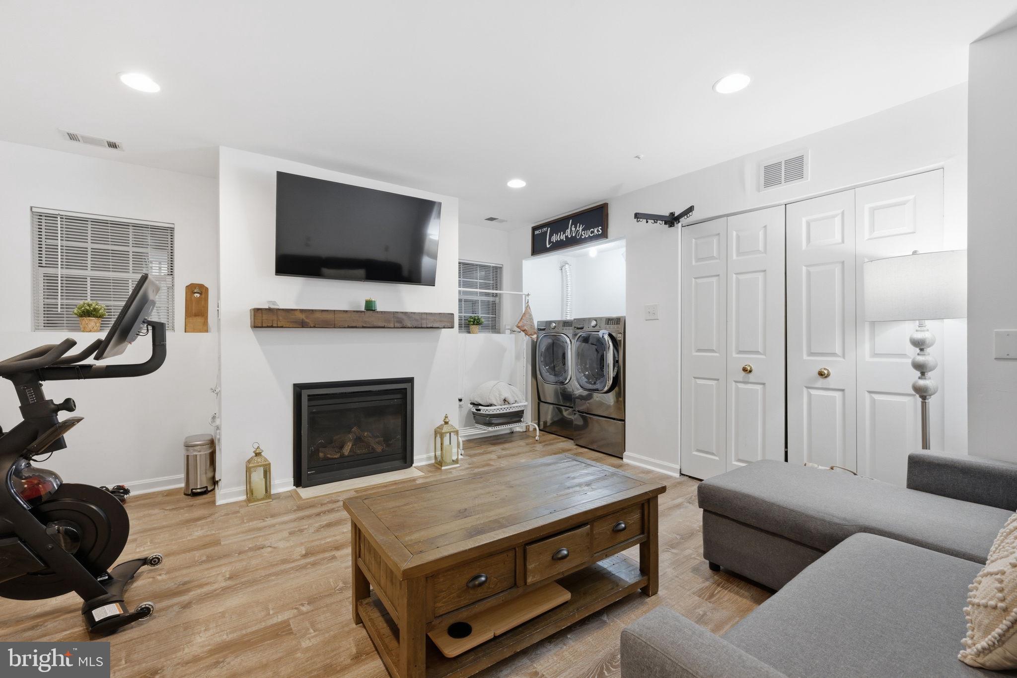 2355 Massanutten Drive Silver Spring, MD 20906 - Photo 23 of 29 Fully finished lower level with gas fireplace.