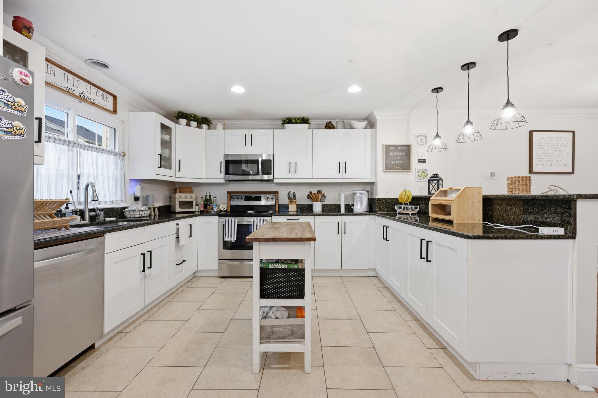 2355 Massanutten Drive Silver Spring, MD 20906 - Photo 7 of 29 Updated kitchen with stainless steel appliances.