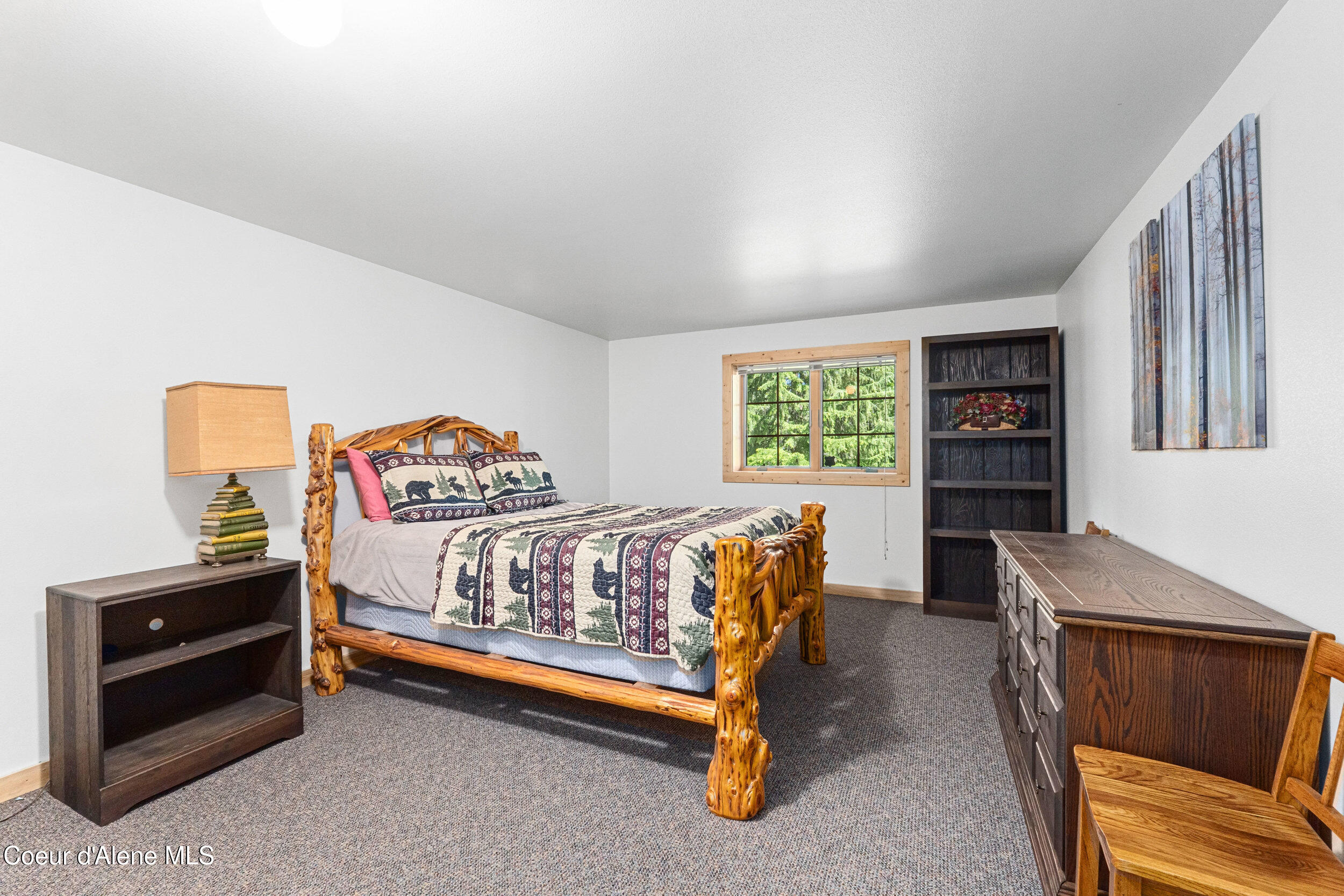 287 Cougar Run Road Priest River, ID 83856 - Photo 41 of 56 Basement bedroom