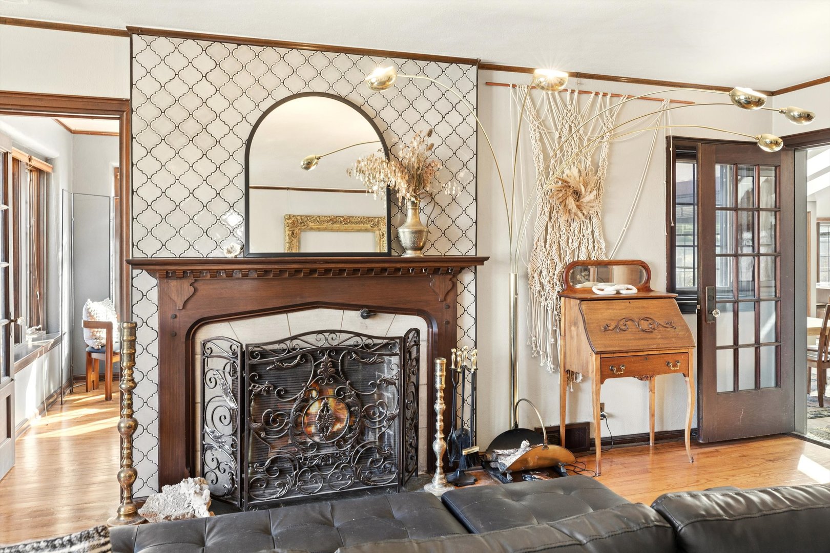 716 Terrace Drive Clinton, IA 52732 - Photo 20 of 78 a living room with furniture a fireplace and a large window