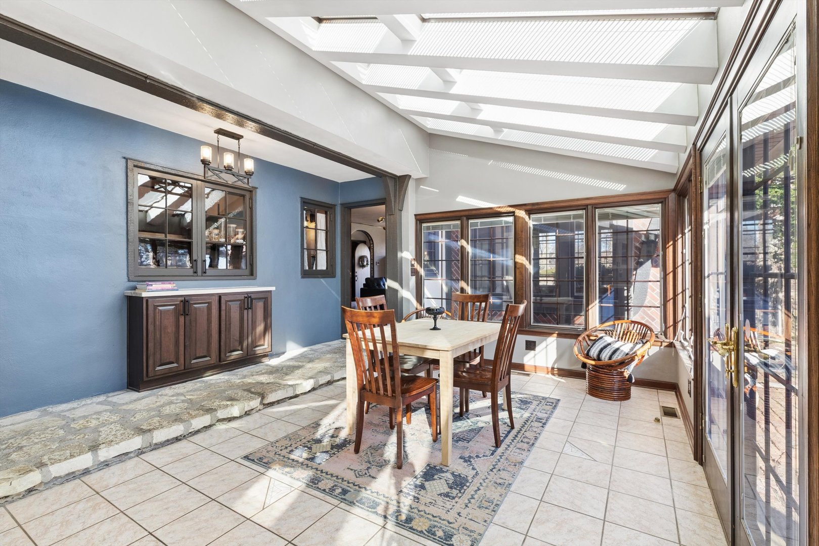 716 Terrace Drive Clinton, IA 52732 - Photo 29 of 78 a dining room with furniture a chandelier and wooden floor